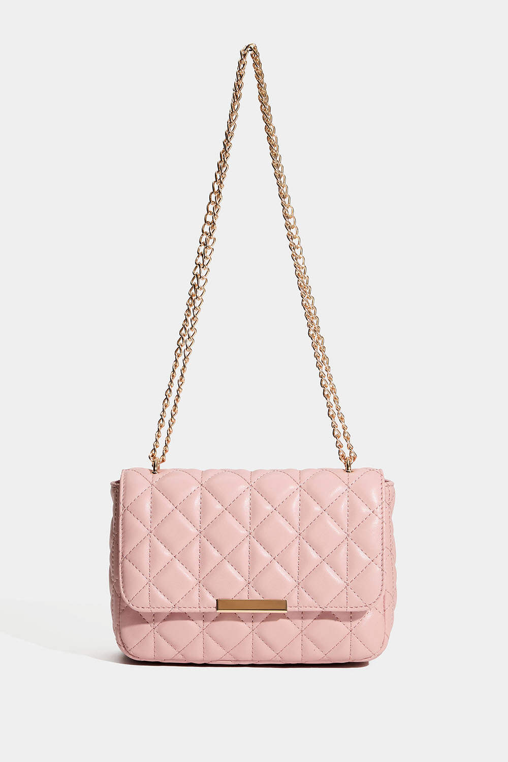 Rosa väska med quiltad design och guldfärgad axelrem