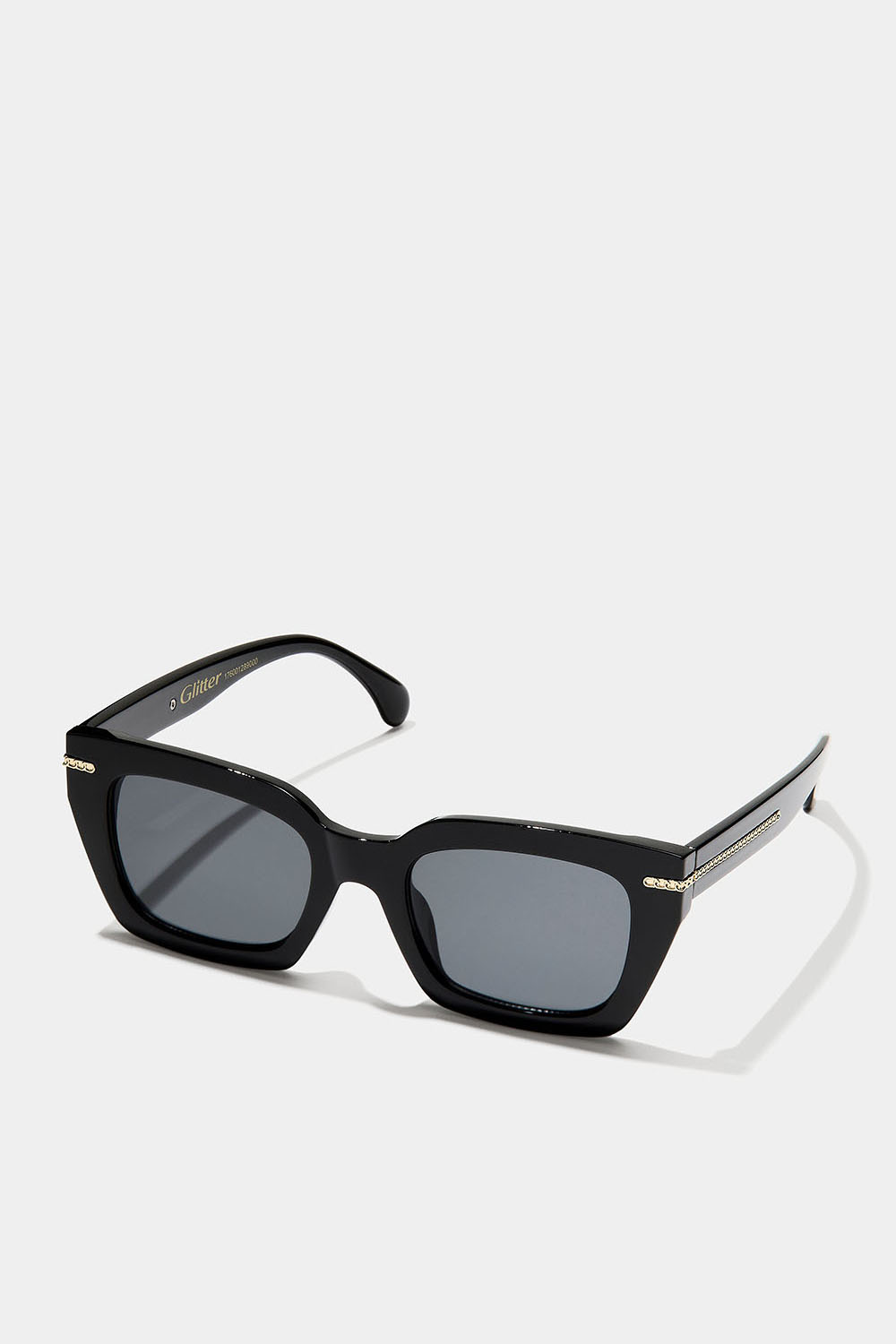 Kantiga solglasögon med kedjedetail.