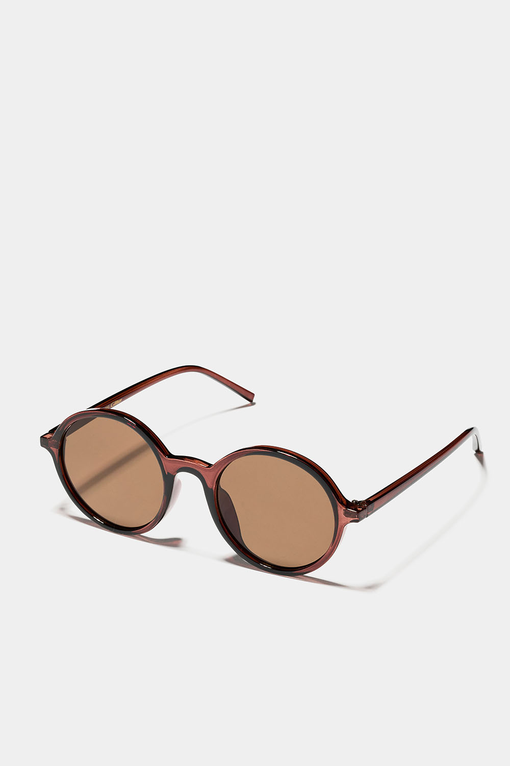 Runda solglasögon med bruna bågar