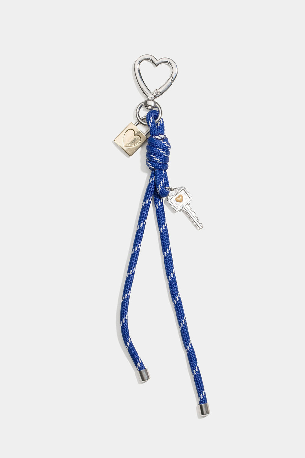 Väskdekoration med nyckel, lås och rep