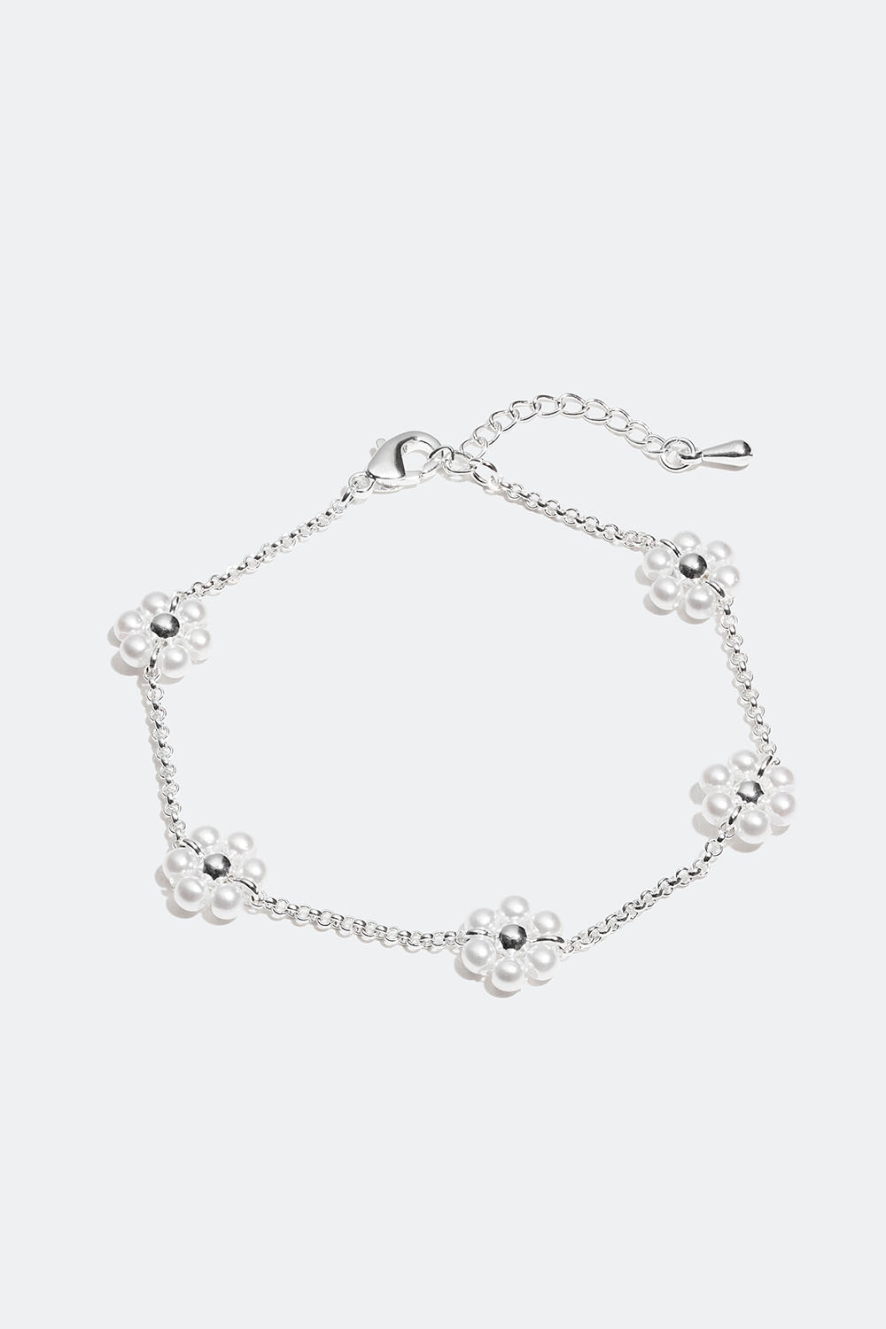 Armband med vita blommor