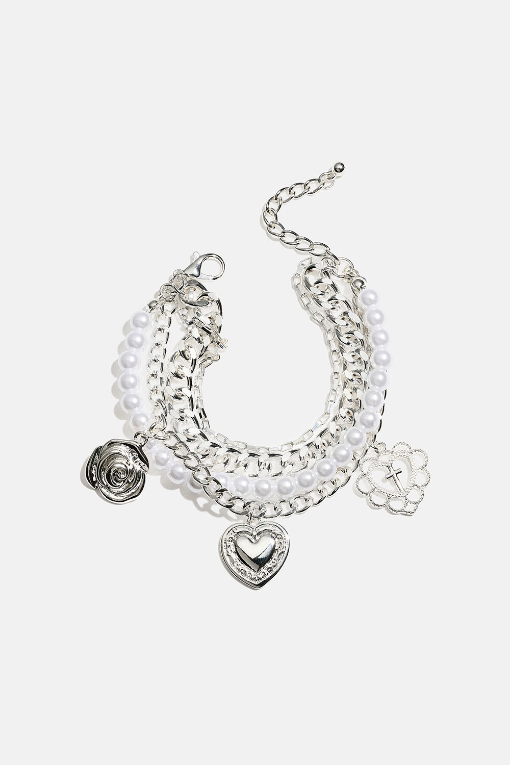 Armband med fyra länkar och berlocker