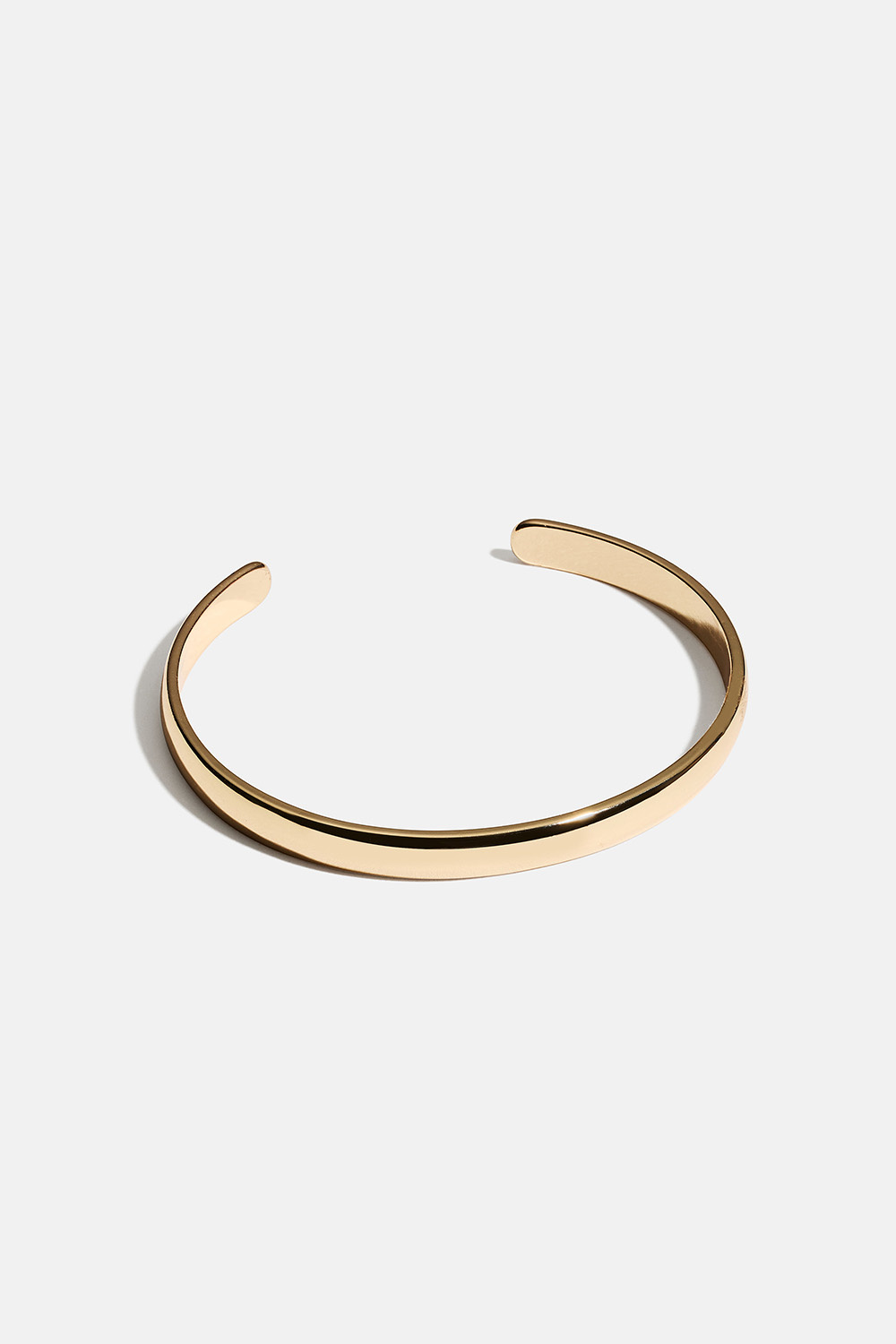 Smalt guldfärgat cuff-armband