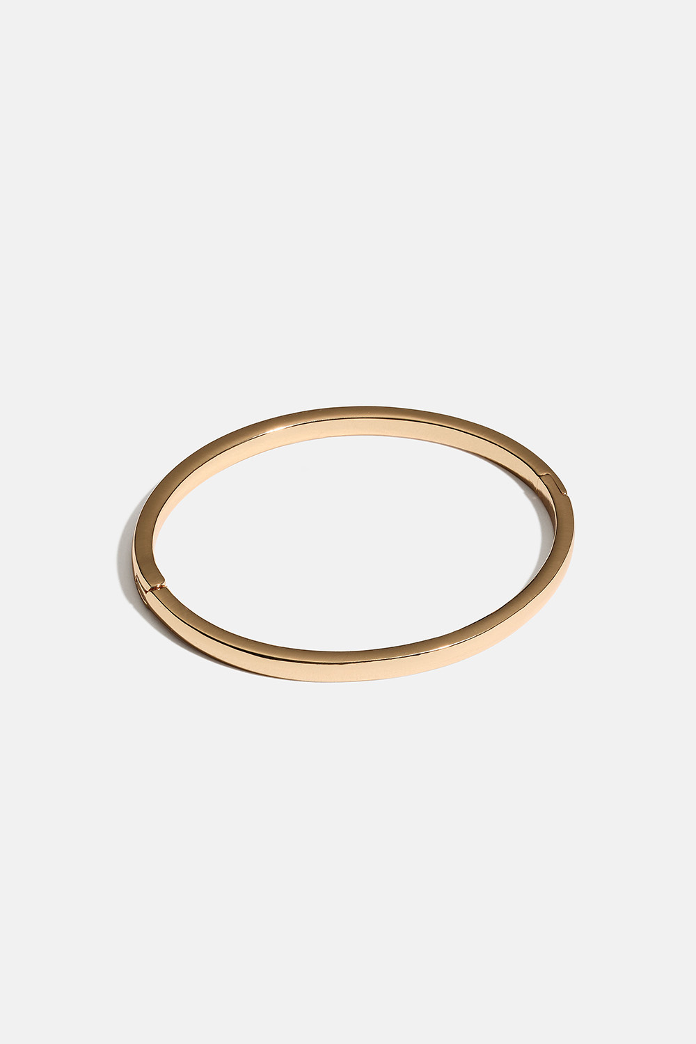 Smal guldfärgad bangle