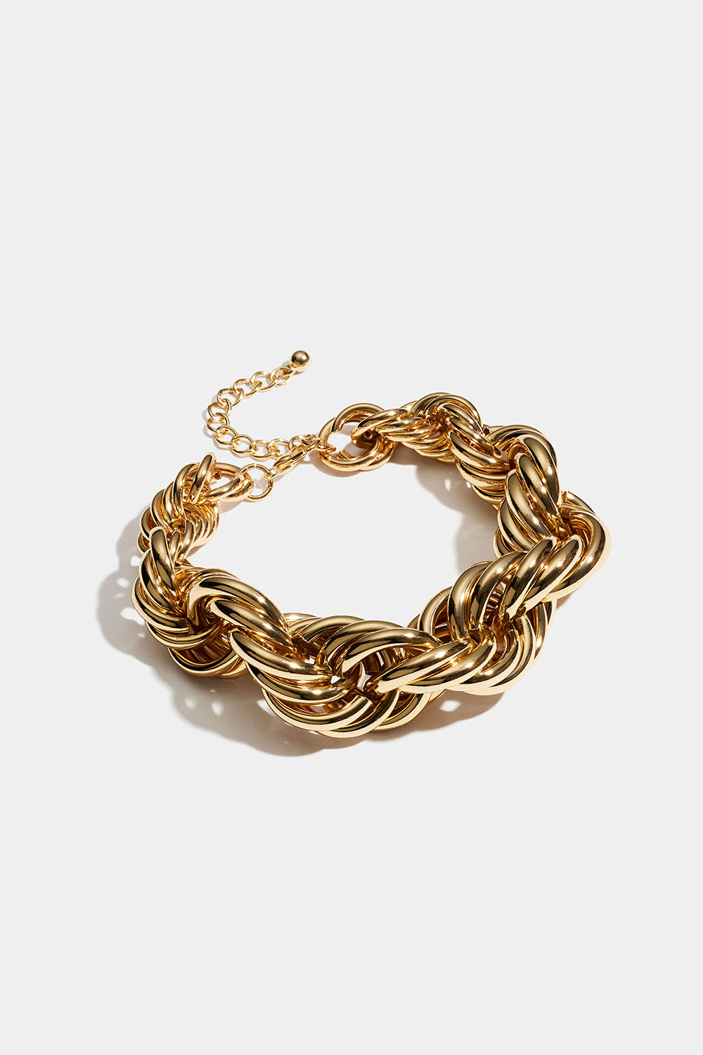 Chunky guldfärgat kedjearmband med tvinnad design