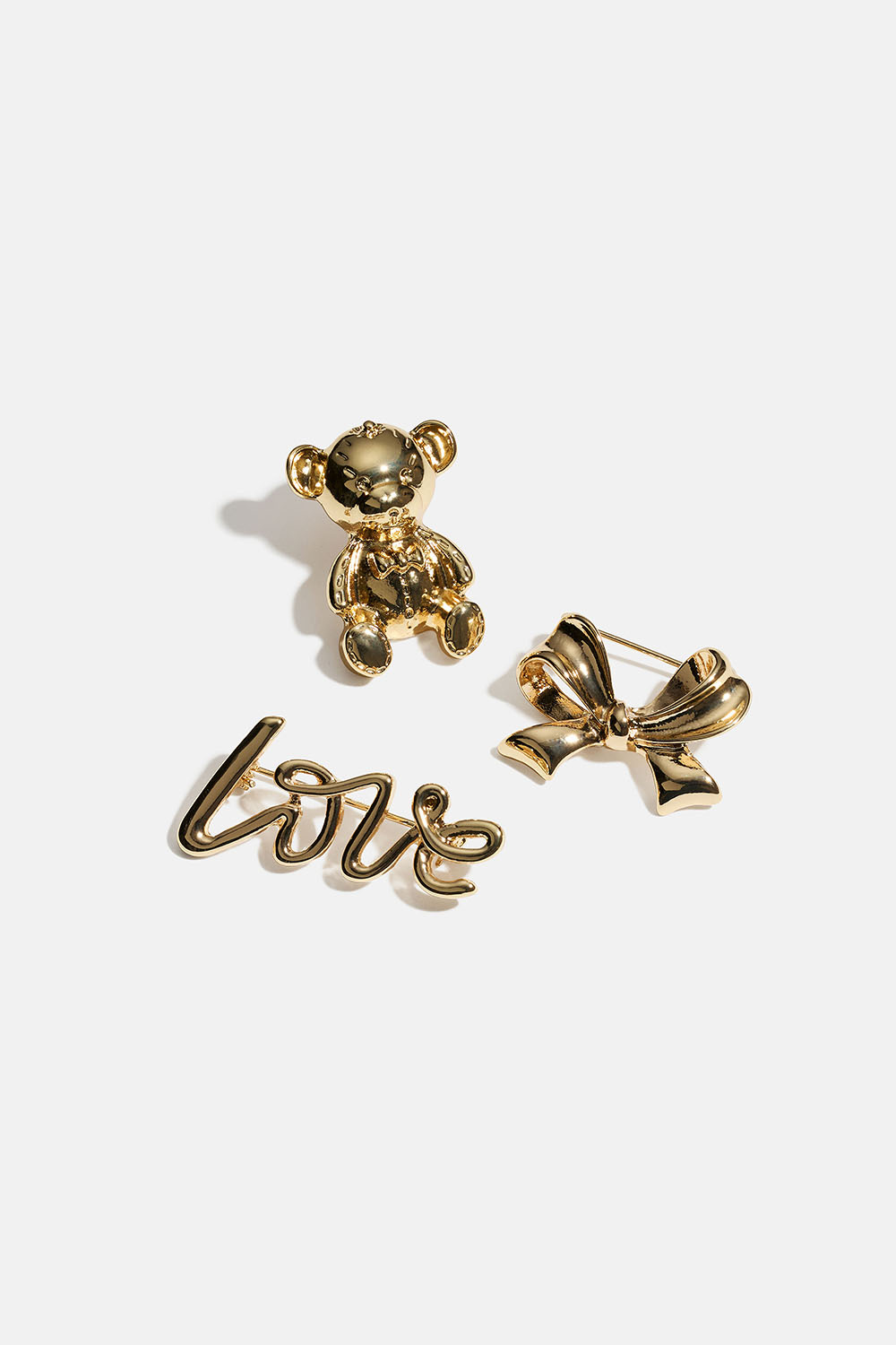 Guldfärgade broscher med rosett, björn och Love, 3-pack