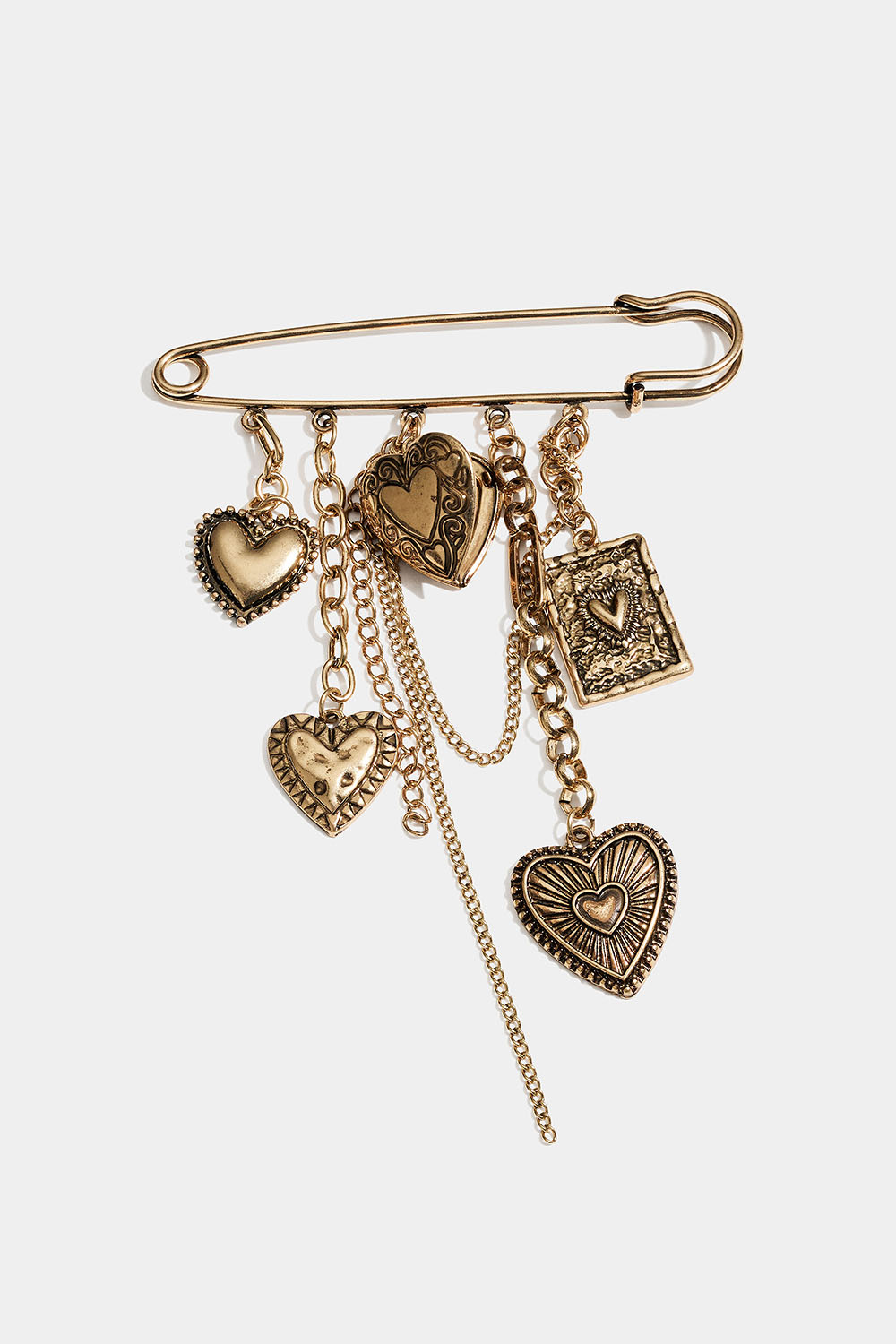 Brosch med säkerhetsnål med hjärtan