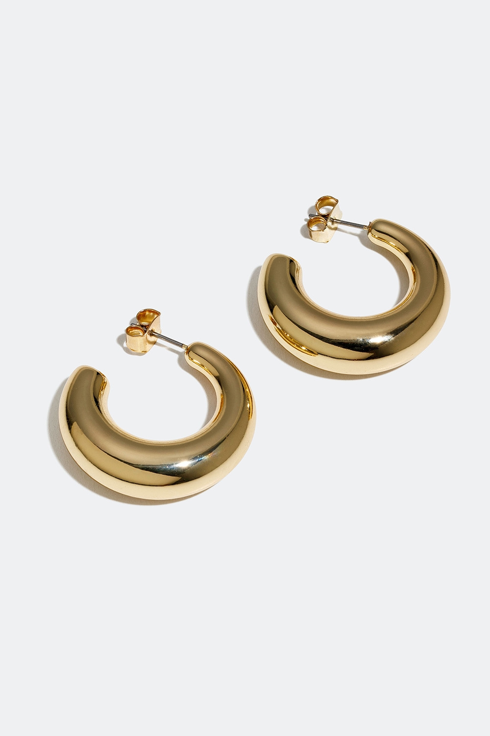 Guldfärgade hoops i bred design