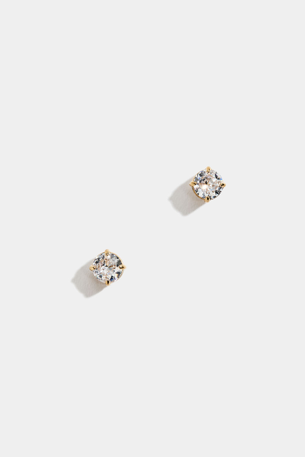 Studs i stål med 18k guld och Cubic Zirconia