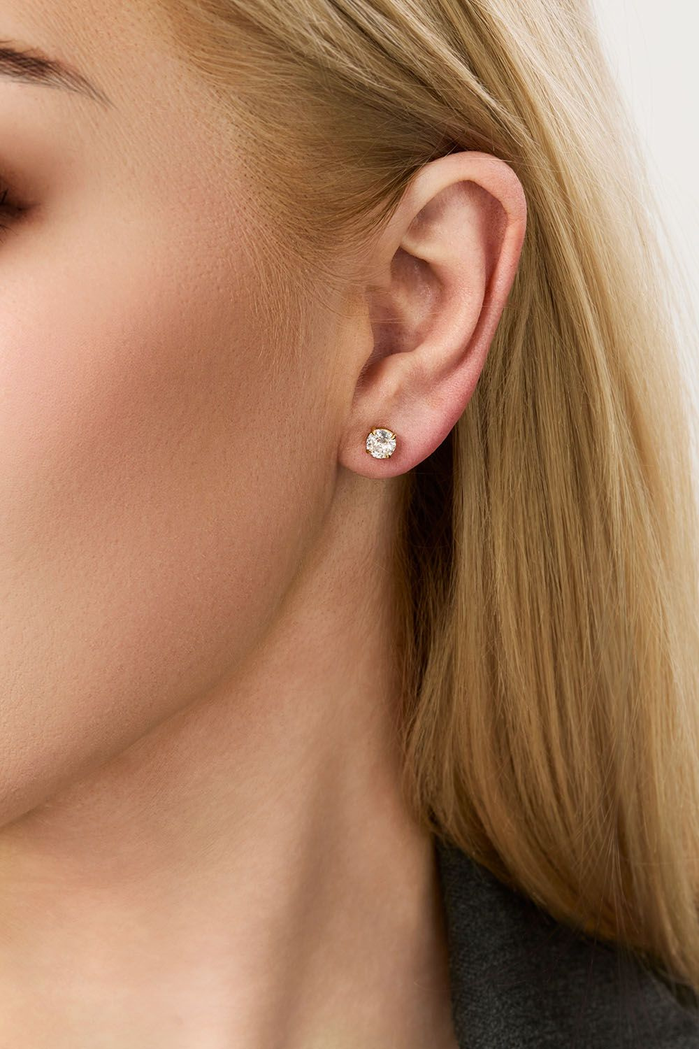 Studs i stål med 18k guld och Cubic Zirconia