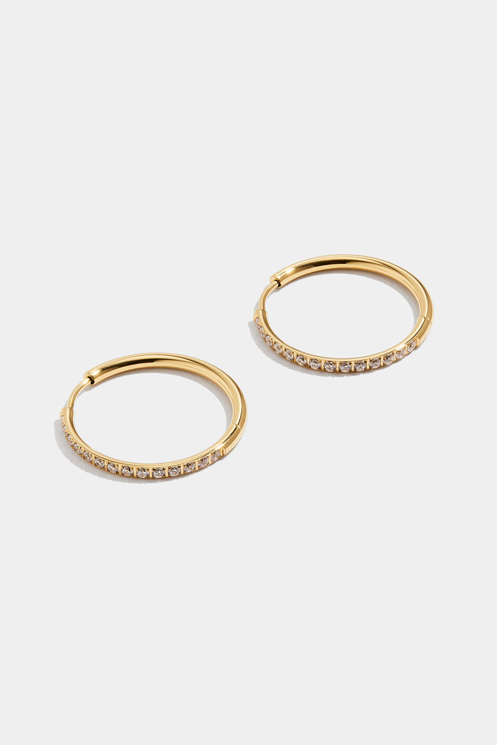 Hoops i stål med 18k guld och Cubic Zirconia