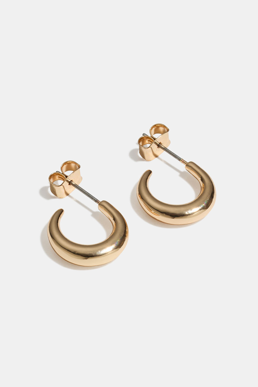 Små guldfärgade rundade hoops