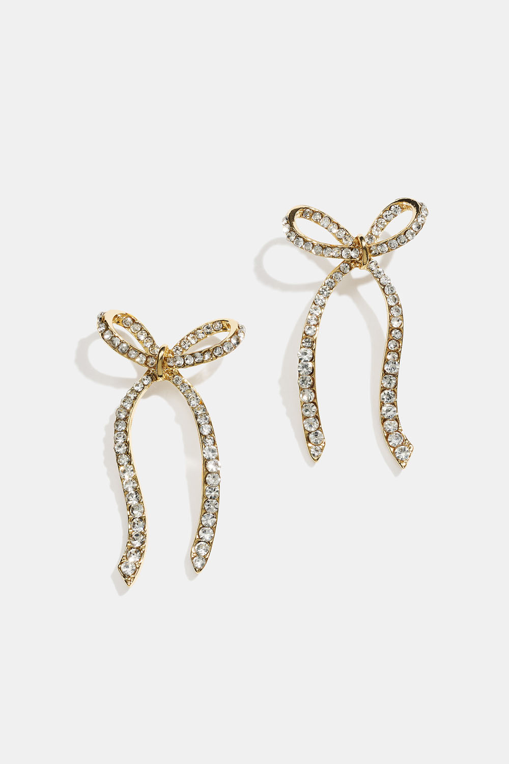 Guldfärgade örhängen med strassrosetter