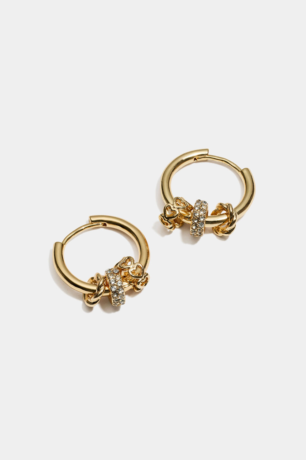 Guldfärgade hoops med runda berlocker