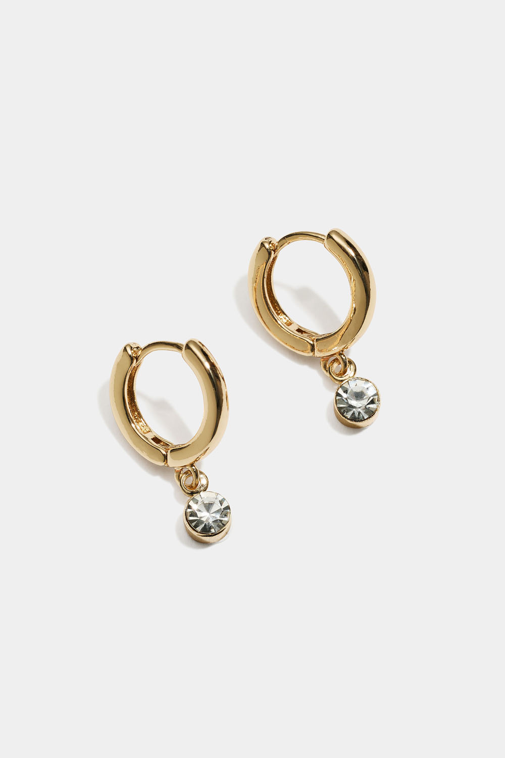 Små guldfärgade hoops med hängande glassten