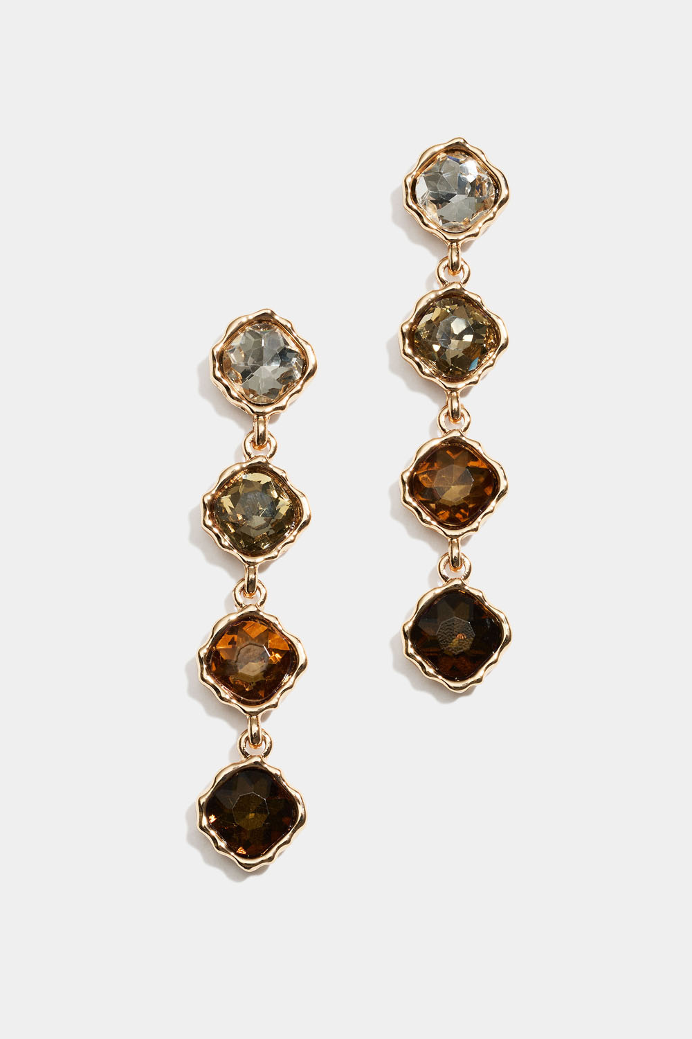 Örhängen med hängande bruna och vita glasstenar 