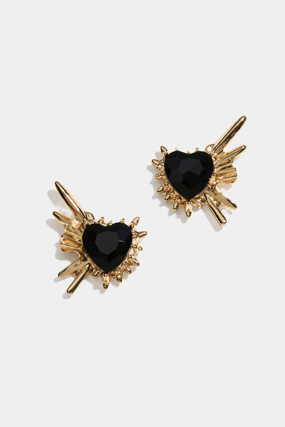 Spetsiga örhängen med svarta hjärtan