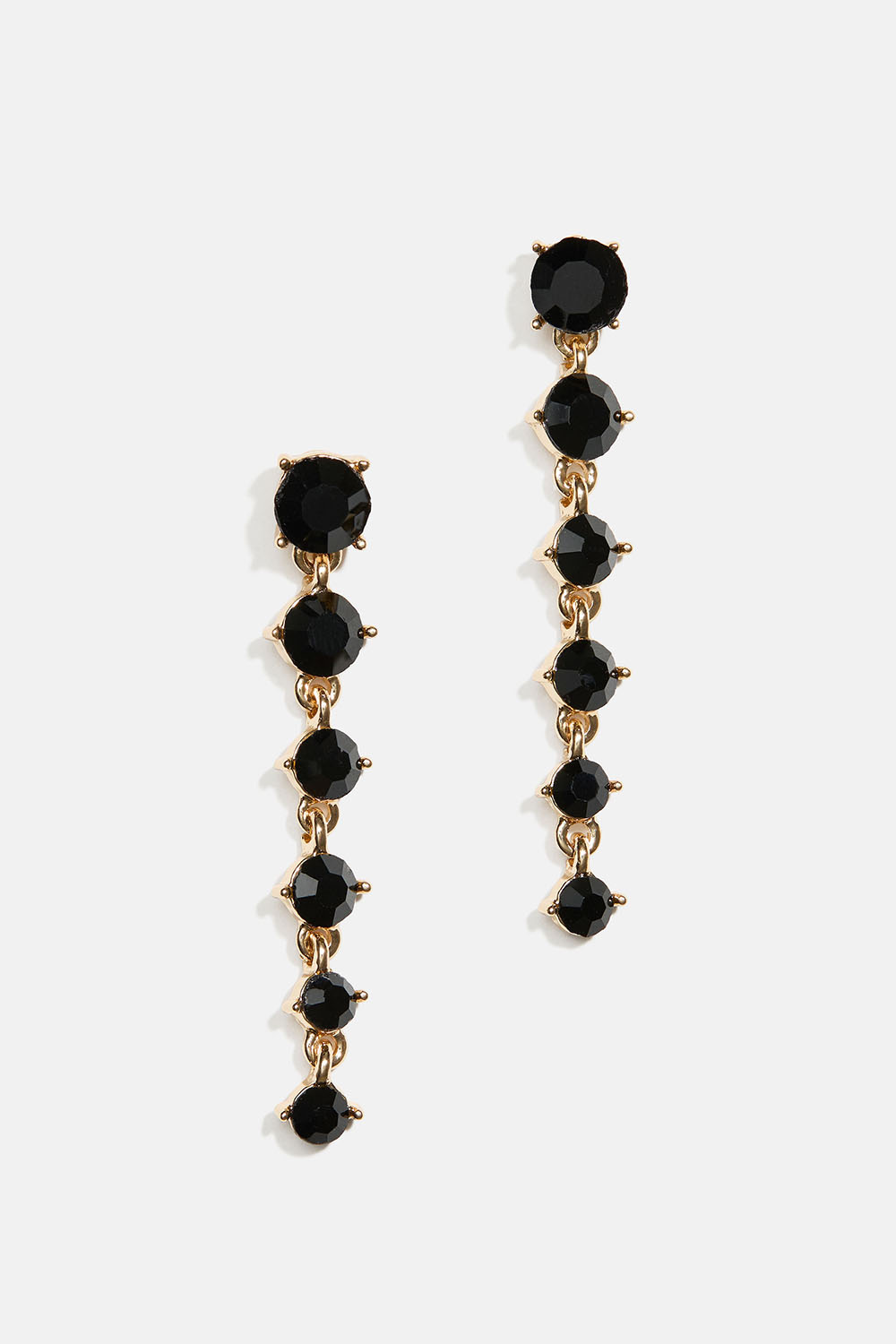 Örhängen med svarta runda glasstenar