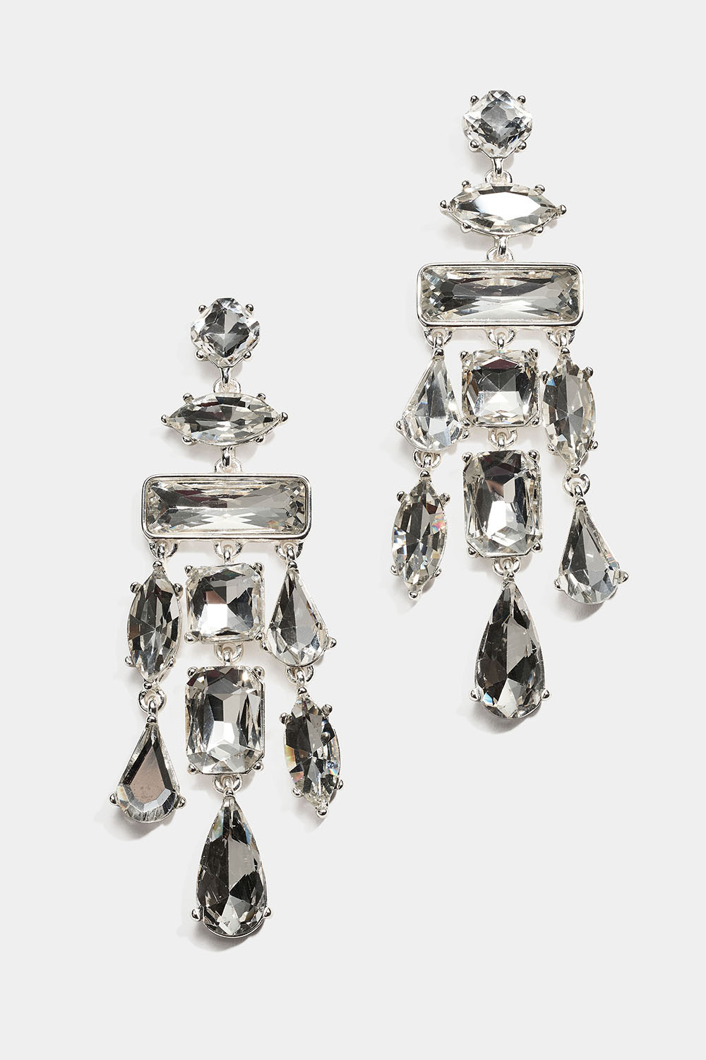 Stora örhängen med glasstenar i olika form