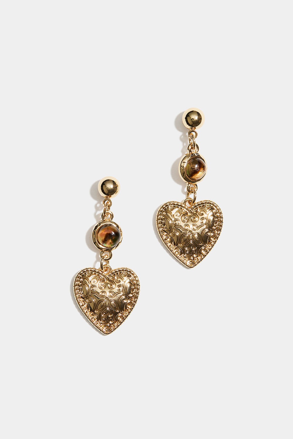 Örhängen med mönstrade hjärtan och bruna pärlor