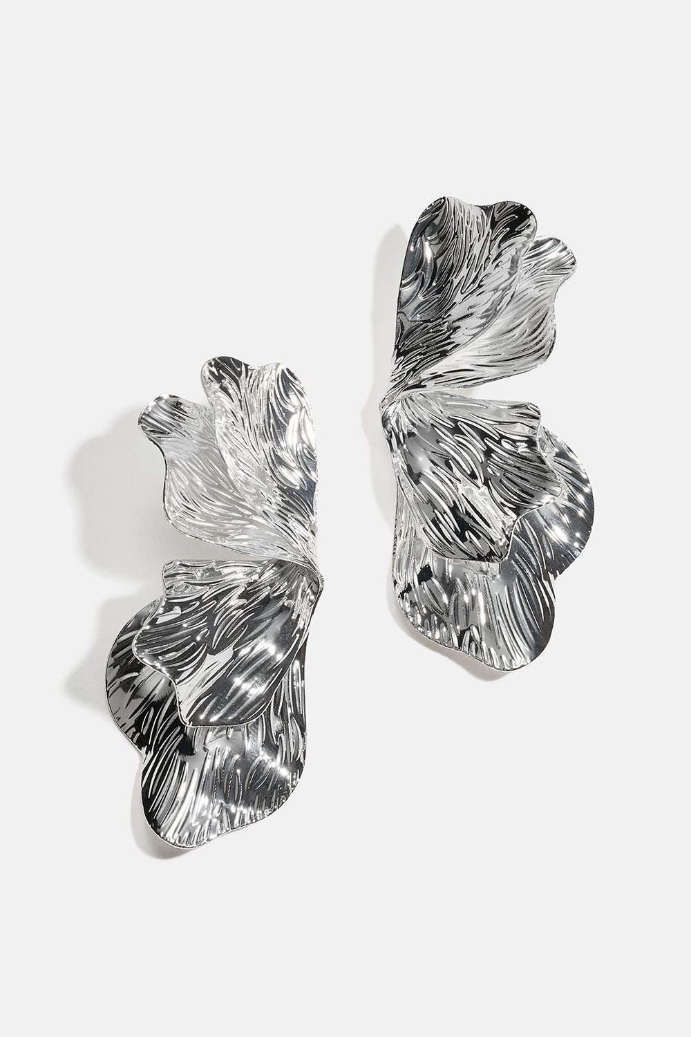 Blombladsformade clipsörhängen