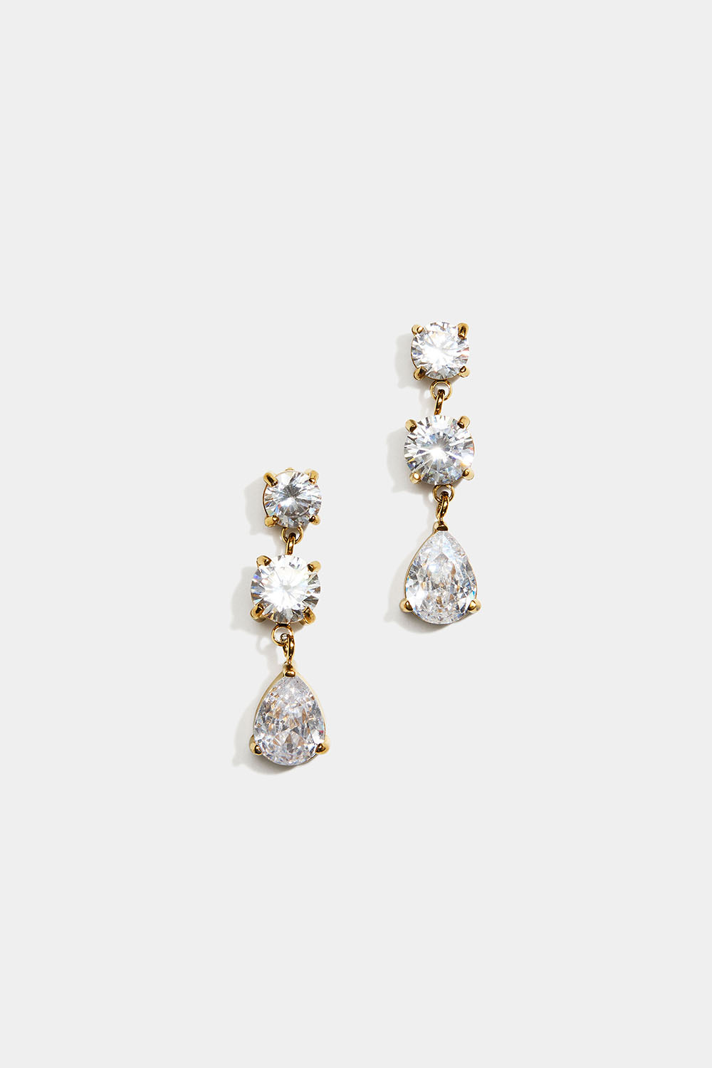 Örhängen i 18k guldpläterat stål med runda och droppformade Cubic Zirconia stenar