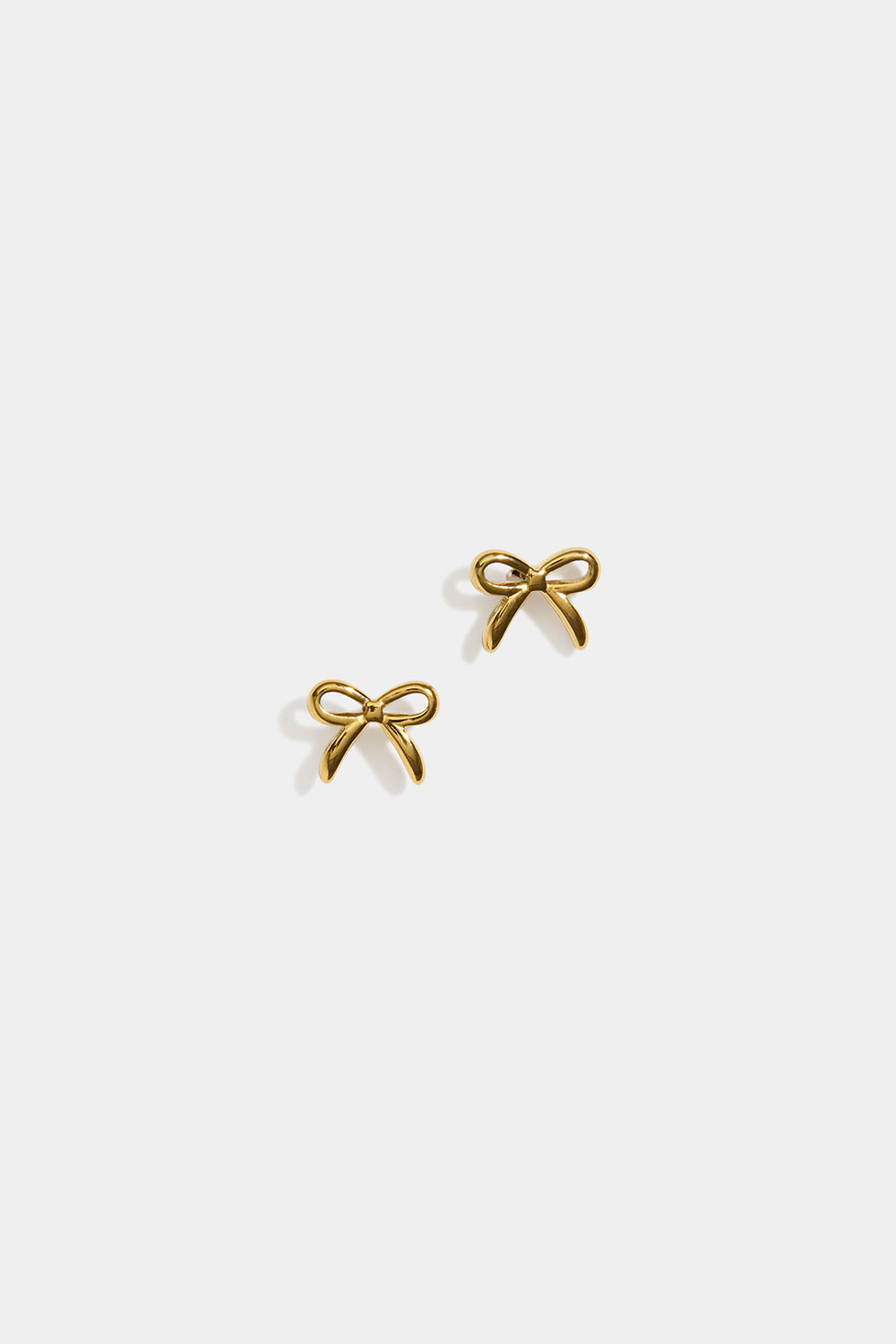 Studs i stål med 18k guld med rosetter