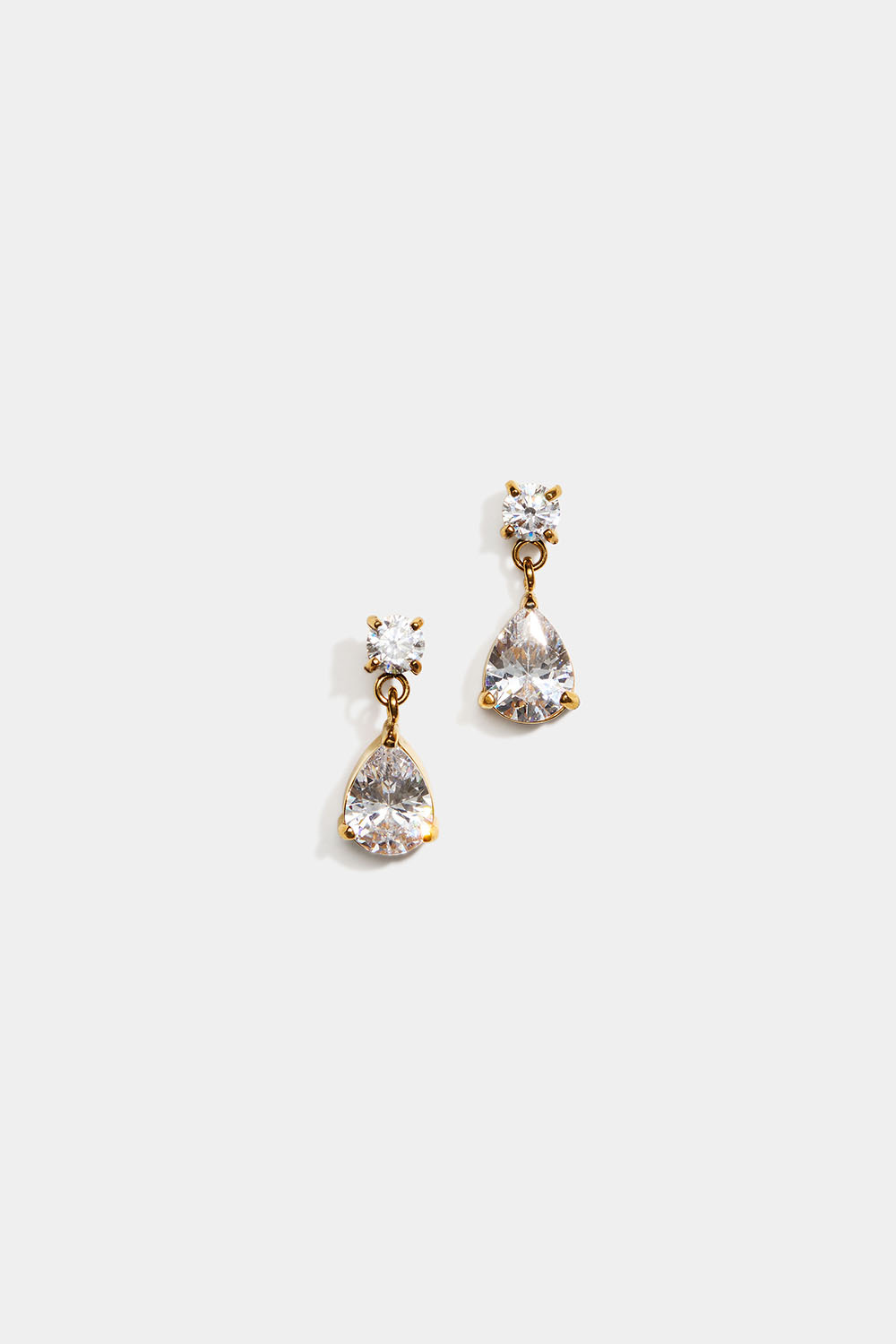 Örhängen i stål med 18k guld med droppformade hängen i Cubic Zirconia