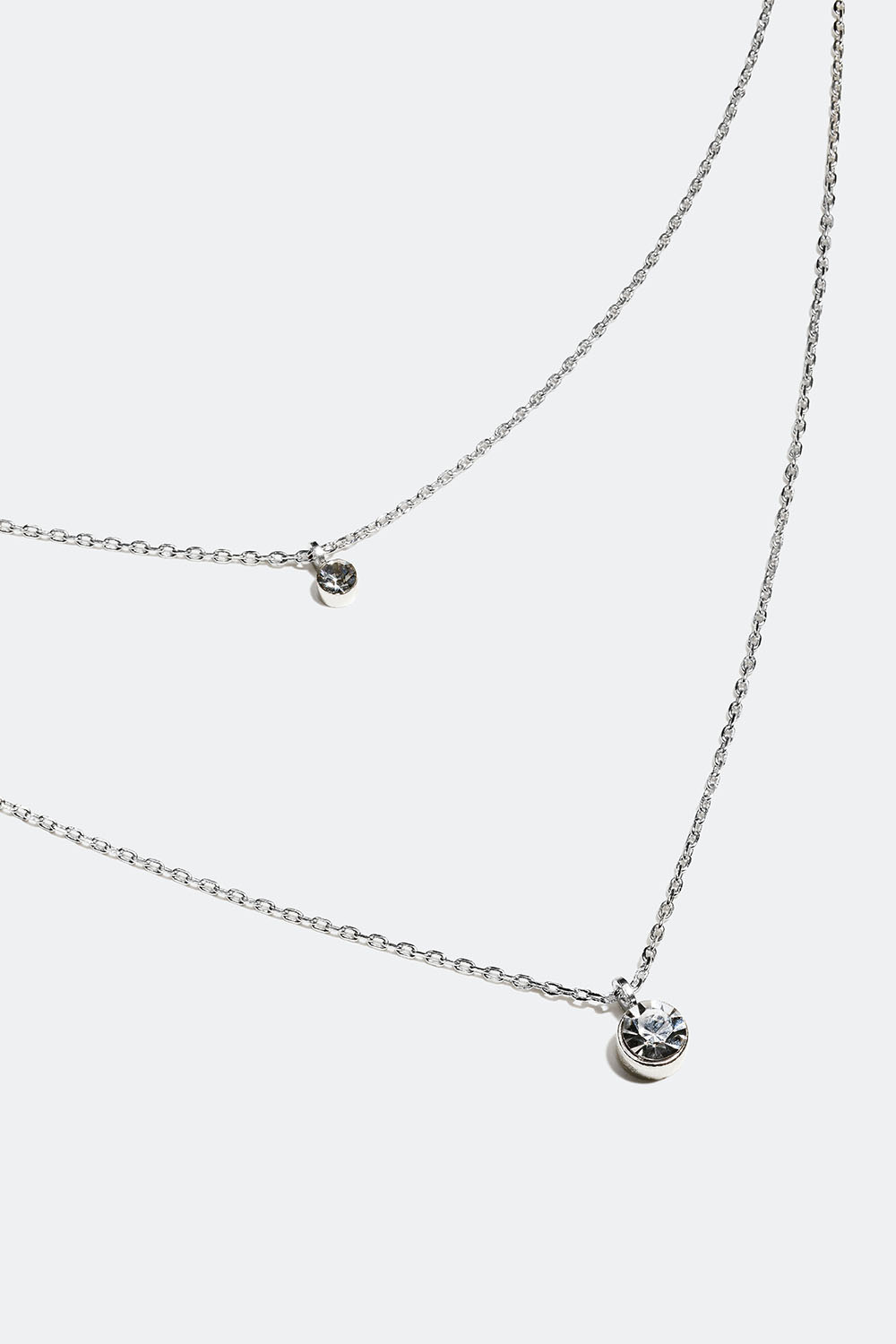 Dubbelhalsband med två små glasstenar