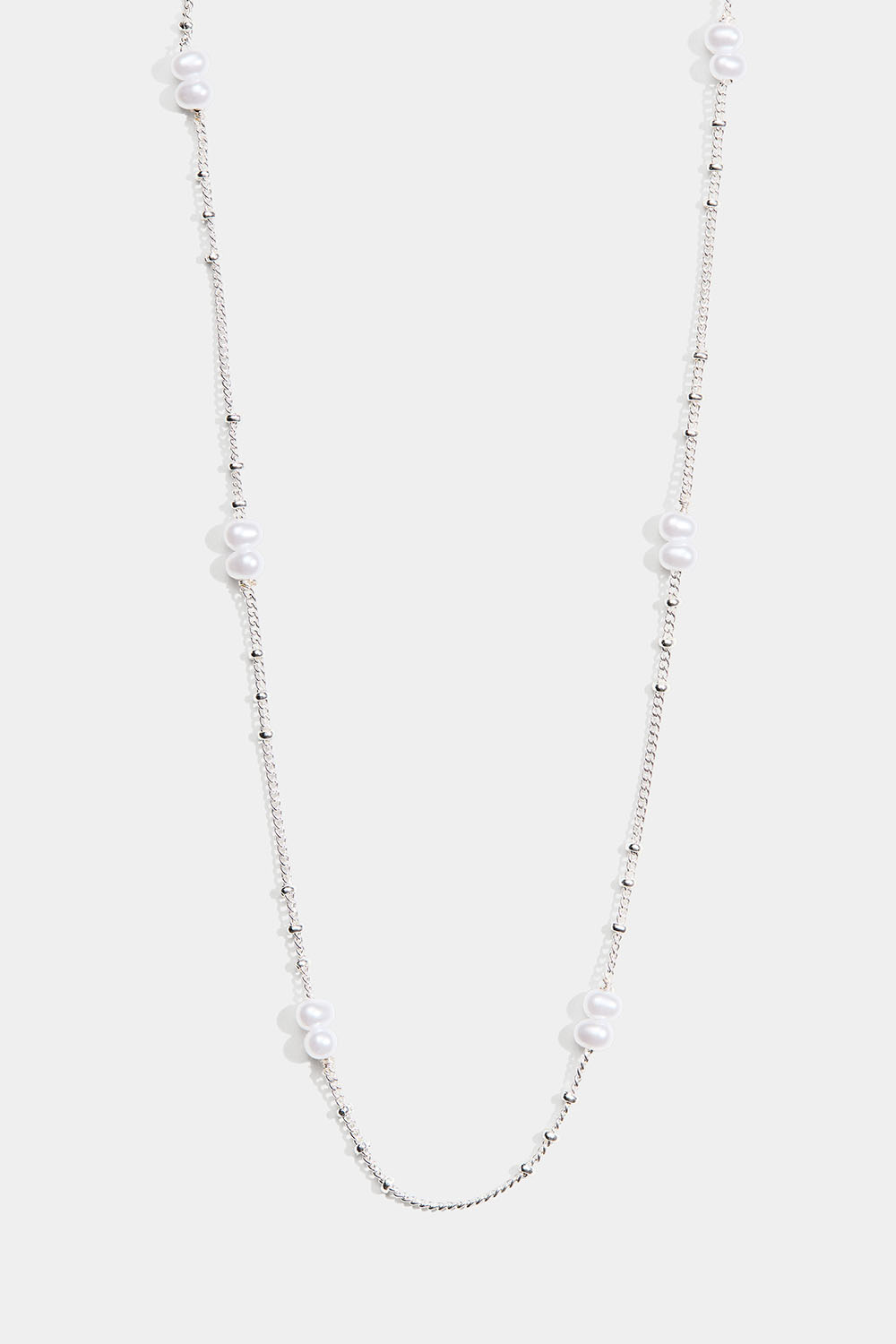 Tunt halsband med ovala vita pärlor