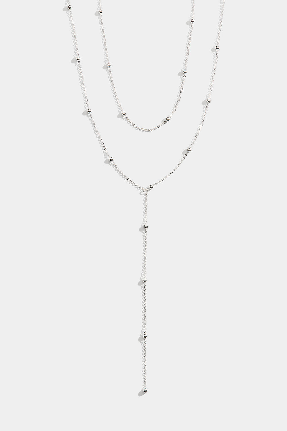 Lariat-halsband med småkulor, silverfärgat