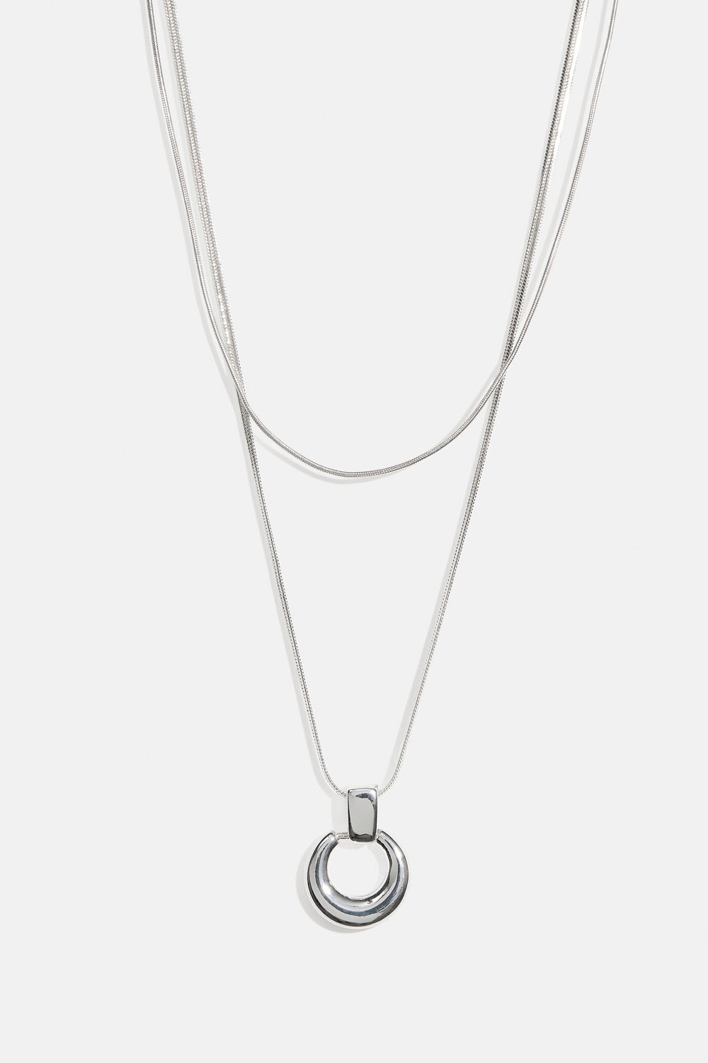 Dubbelhalsband med runt hänge