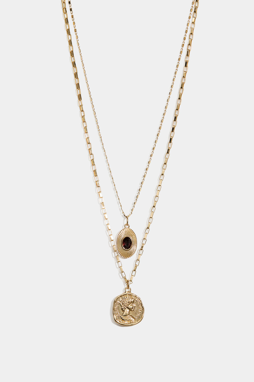 Guldfärgat dubbelhalsband med myntberlock