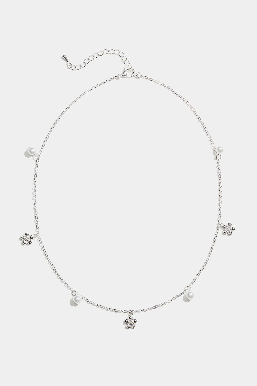 Halsband med blommor och vita pärlor