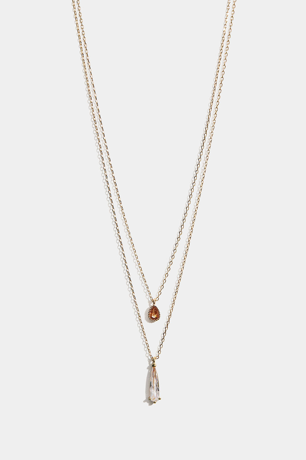 Guldfärgat dubbelhalsband med droppformade hängen