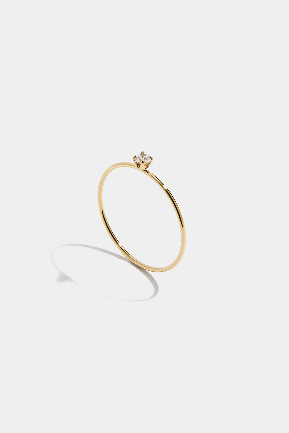 Tunn ring i stål med 18k guld och Cubic Zirconia