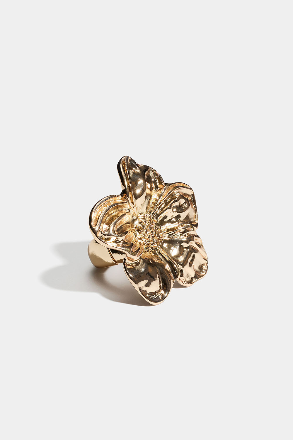 Justerbar guldfärgad ring med blomma