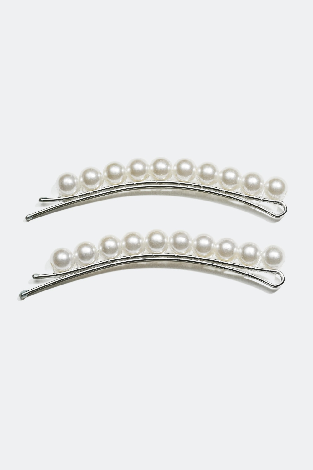 Hårspännen med plastpärlor 