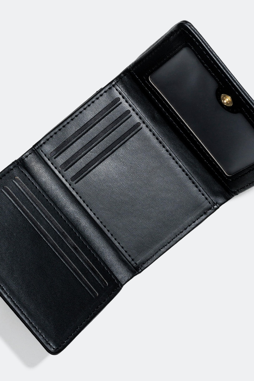 Plånbok med dekorationer i form av hjärtan 