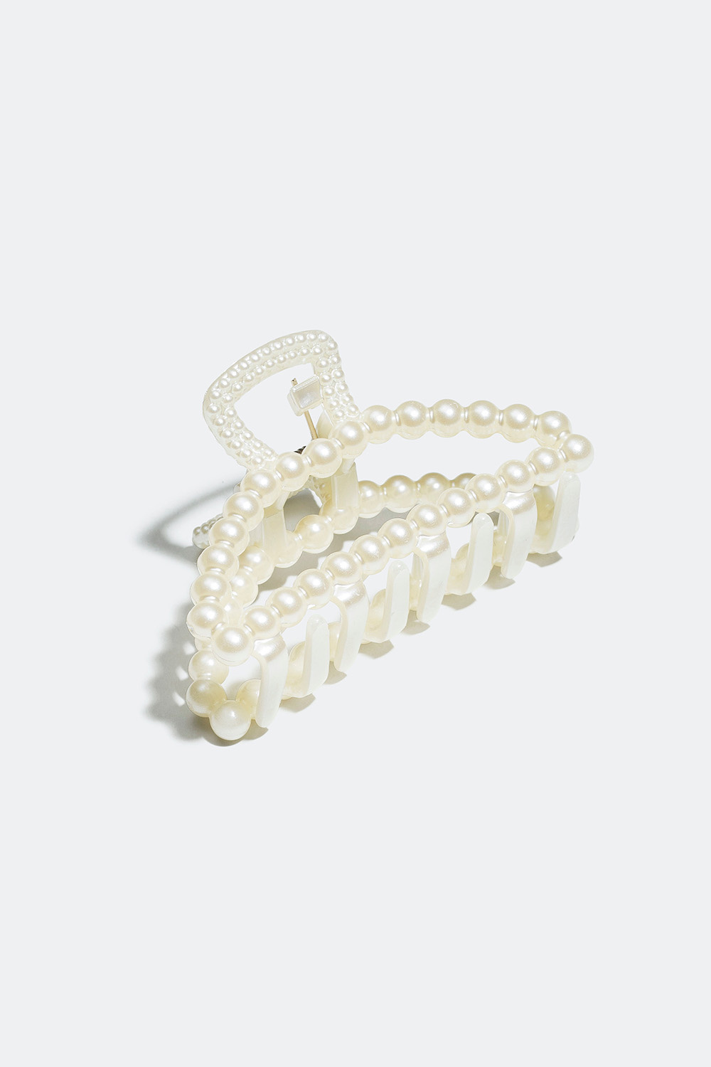 Hårklämma med vita plastpärlor
