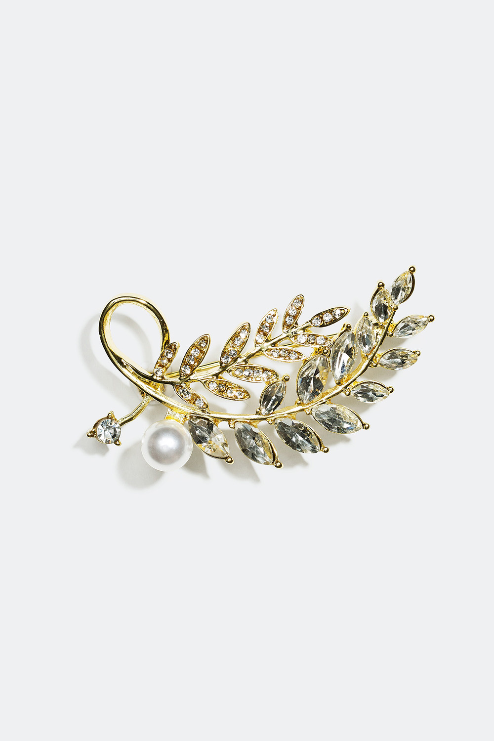 Brosch med lövmotiv och glasstenar