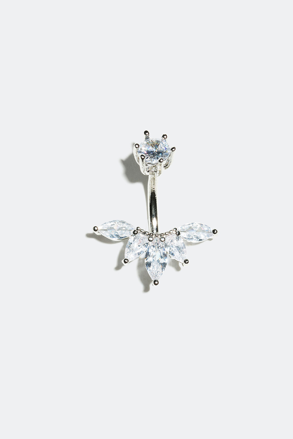 Navelpiercing med båge av ovala glasstenar