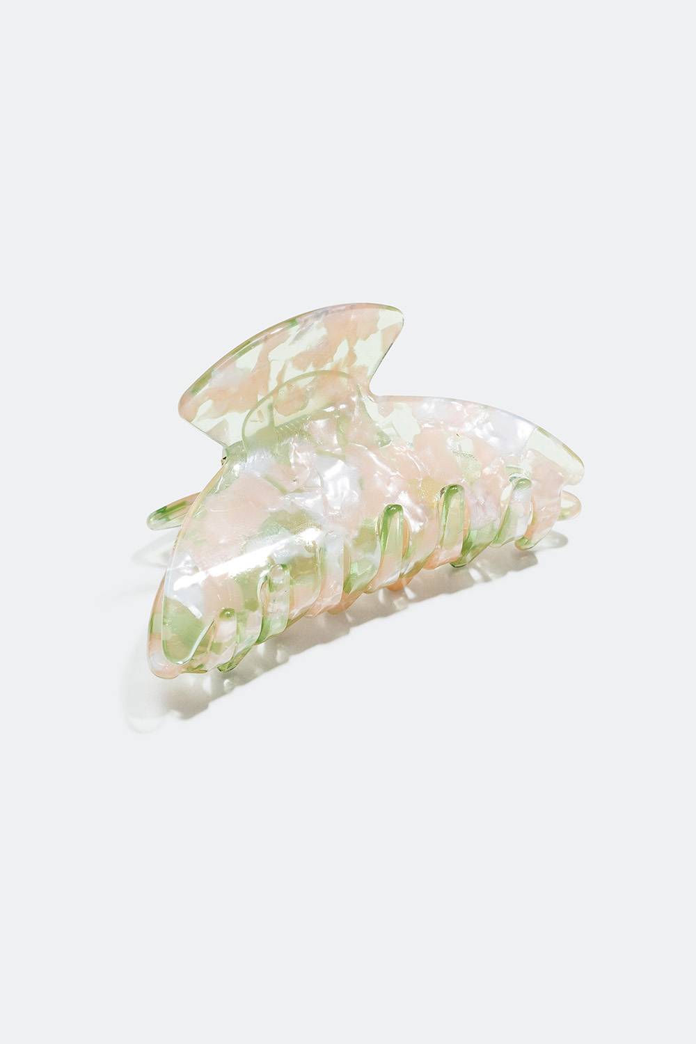 Liten melerad hårklämma i pastell