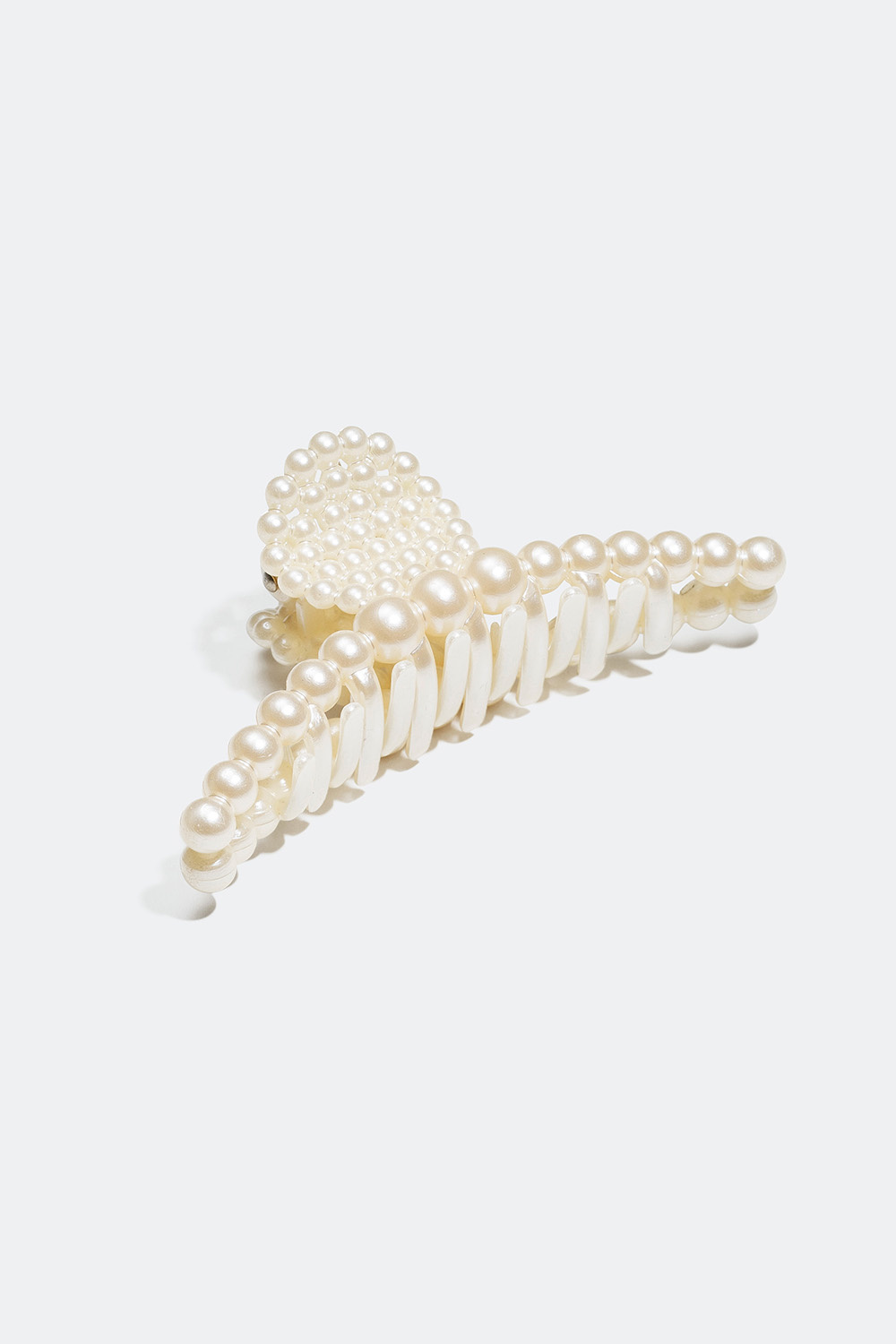 Avlång hårklämma med vita plastpärlor