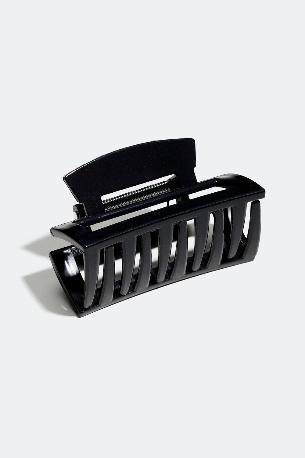 Svart rektangulär hårklämma