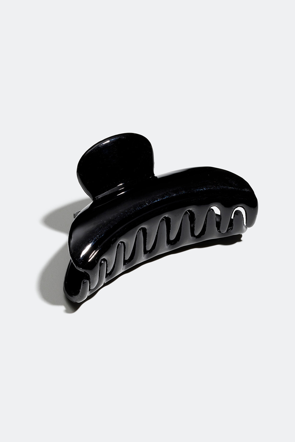 Liten svart hårklämma