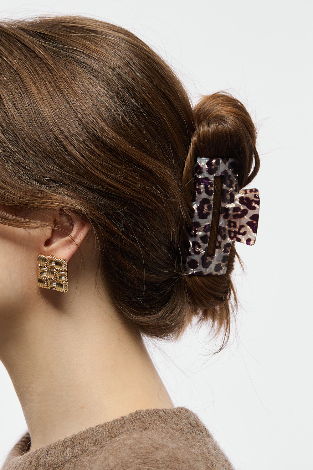 Hårklämma med skimrigt leopardmönster