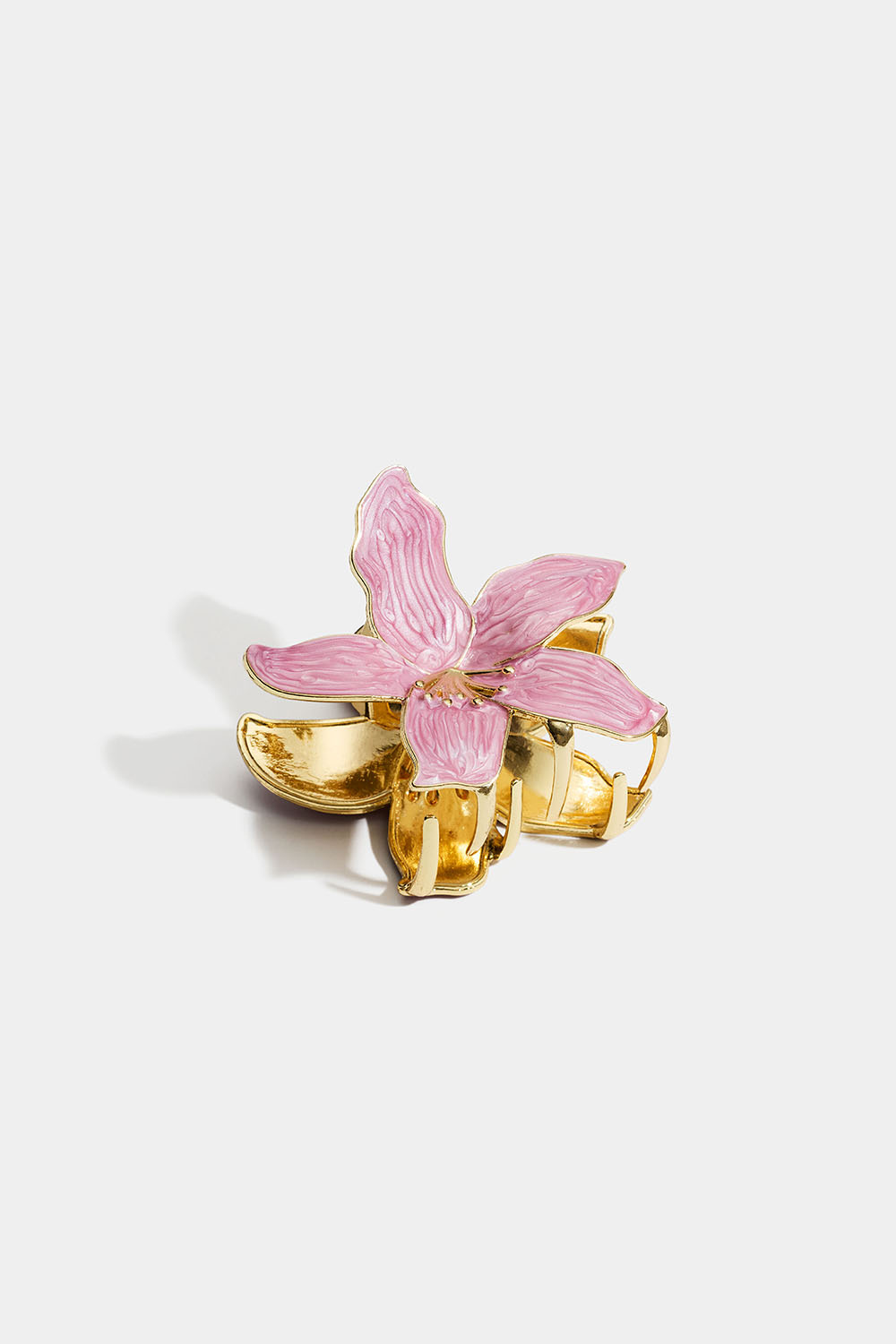 Guldfärgad hårklämma med rosa blomma