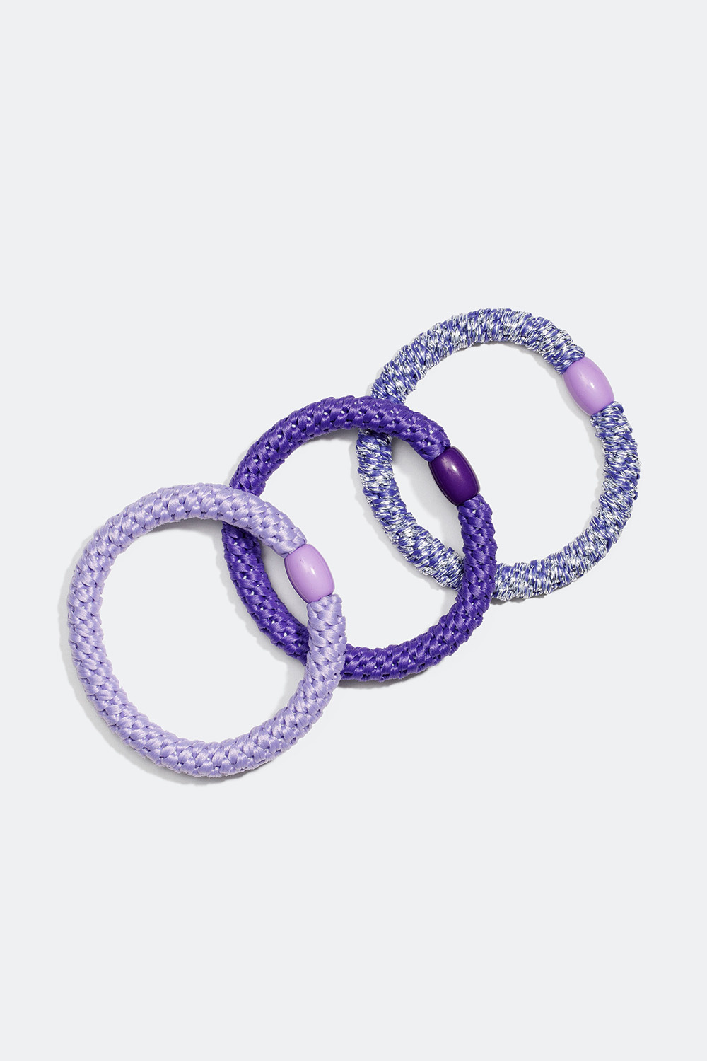 Flätade hårsnoddar i lila, 3-pack