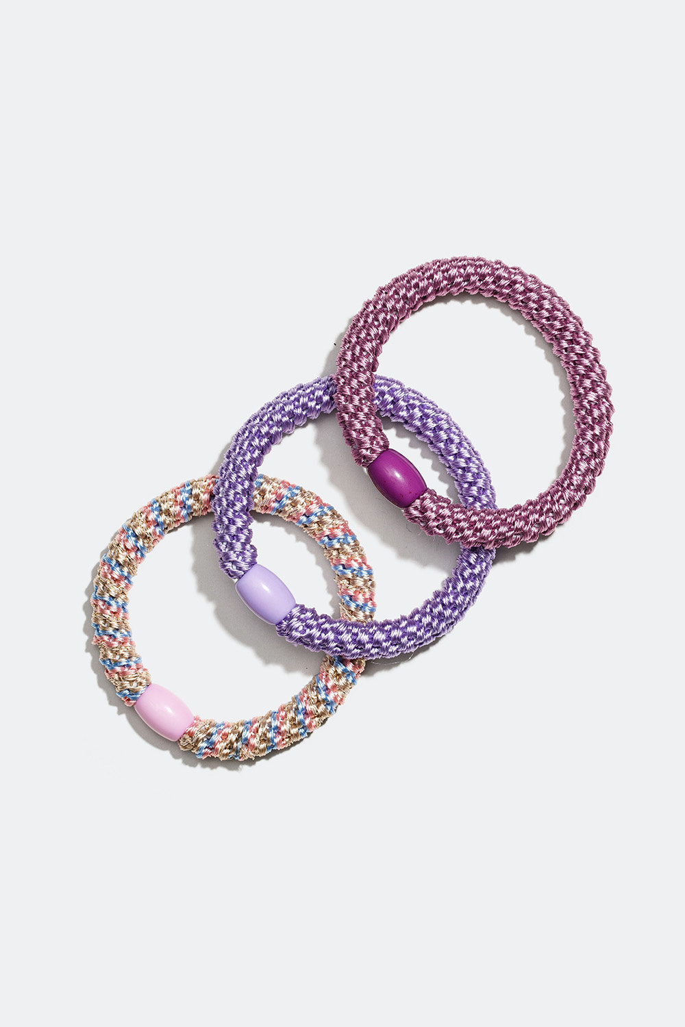Flätade hårsnoddar i lila mix, 3-pack